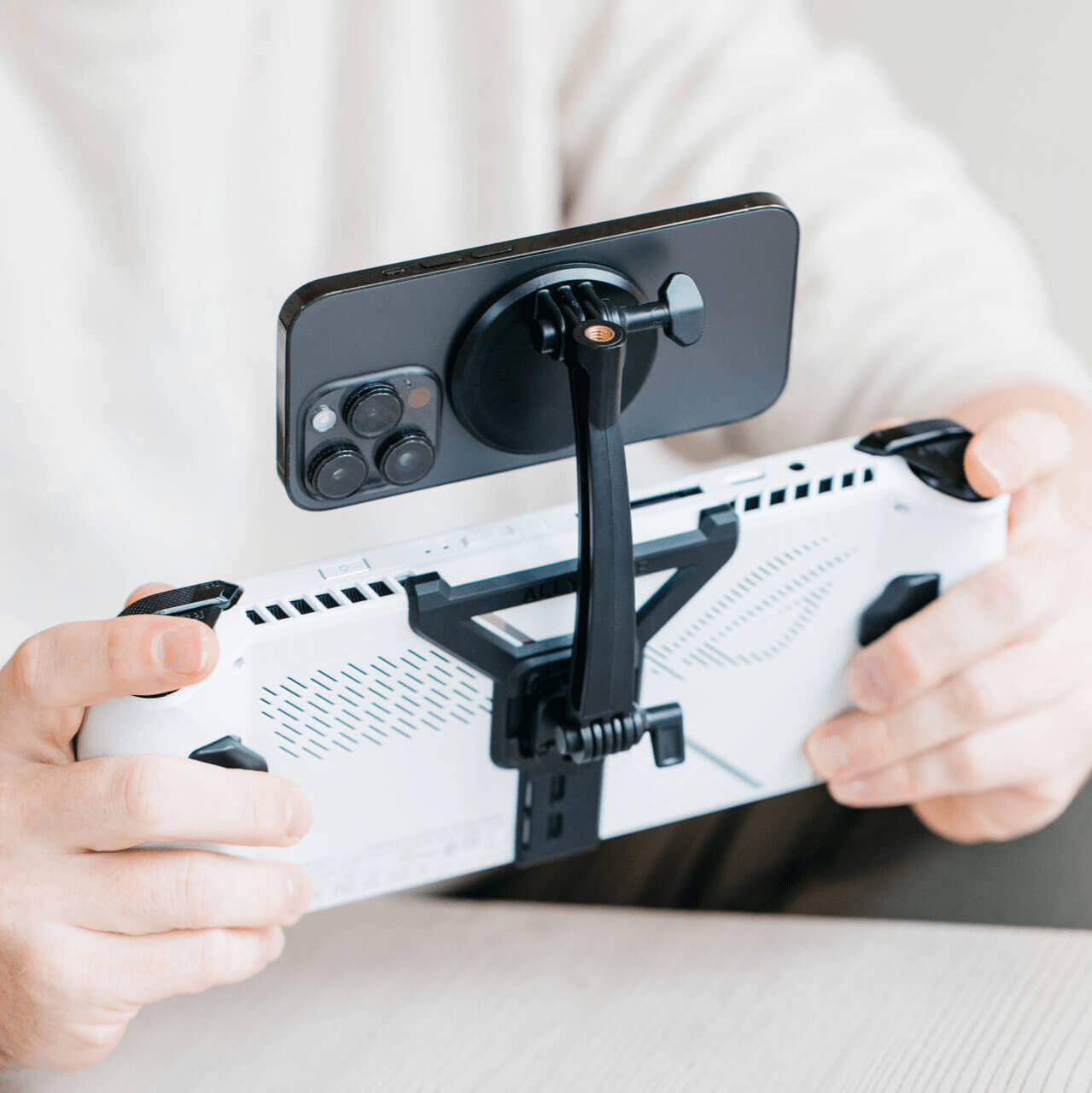 The Mechanism Phone Mount attaches any phone above the screen of an ASUS ROG Ally