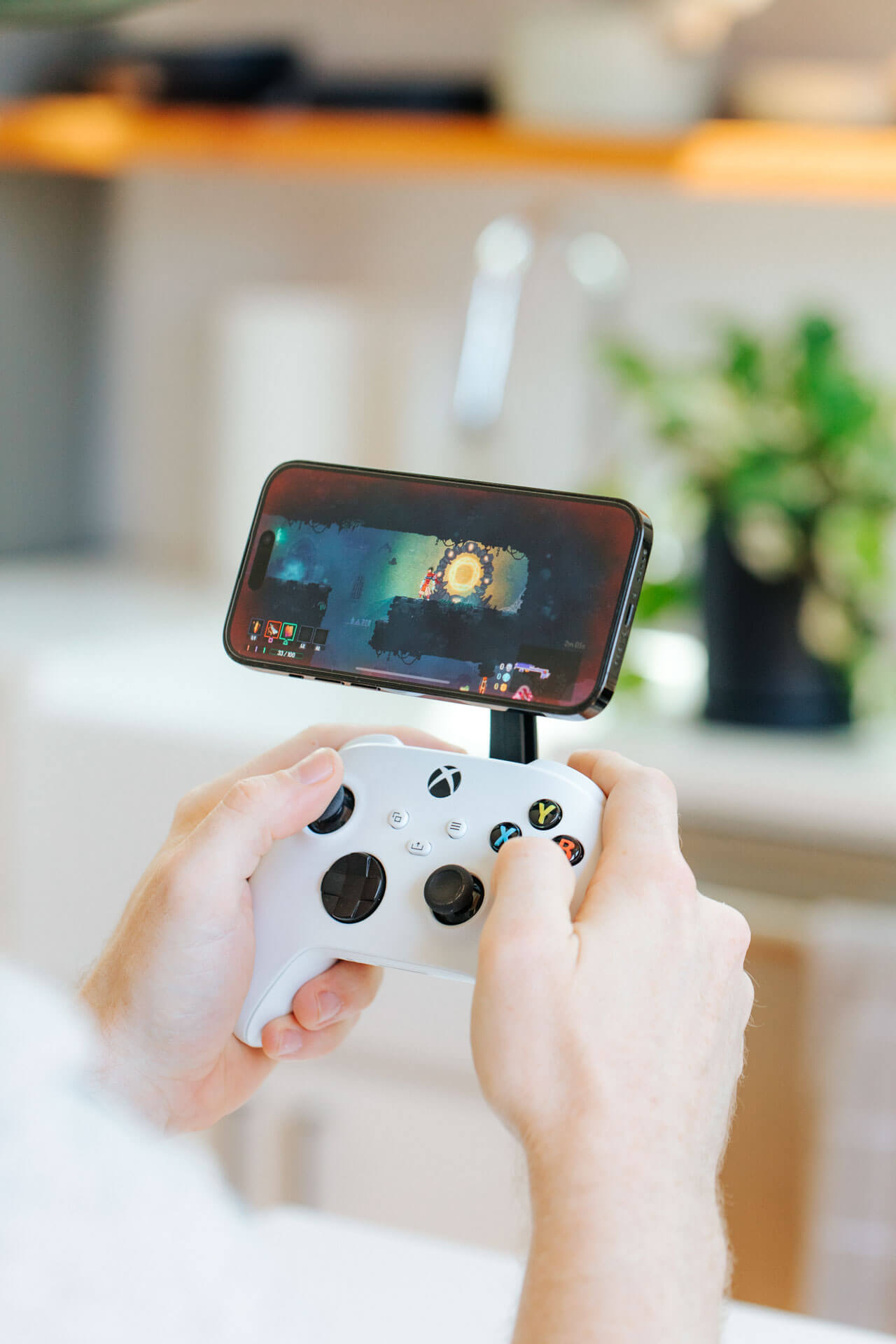 Play your mobile games with your controller using our Magsafe phone mount and controller grips.