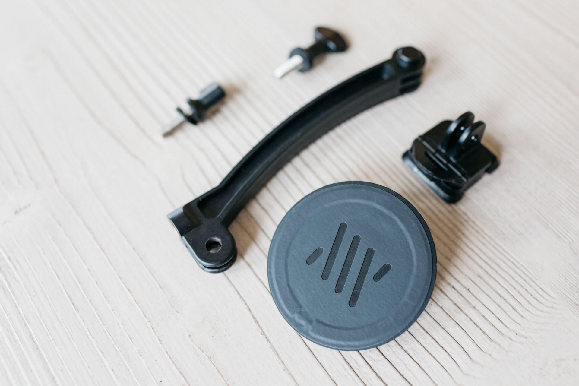 A disassembled Mechanism Phone Mount shows magnetic and GoPro components.