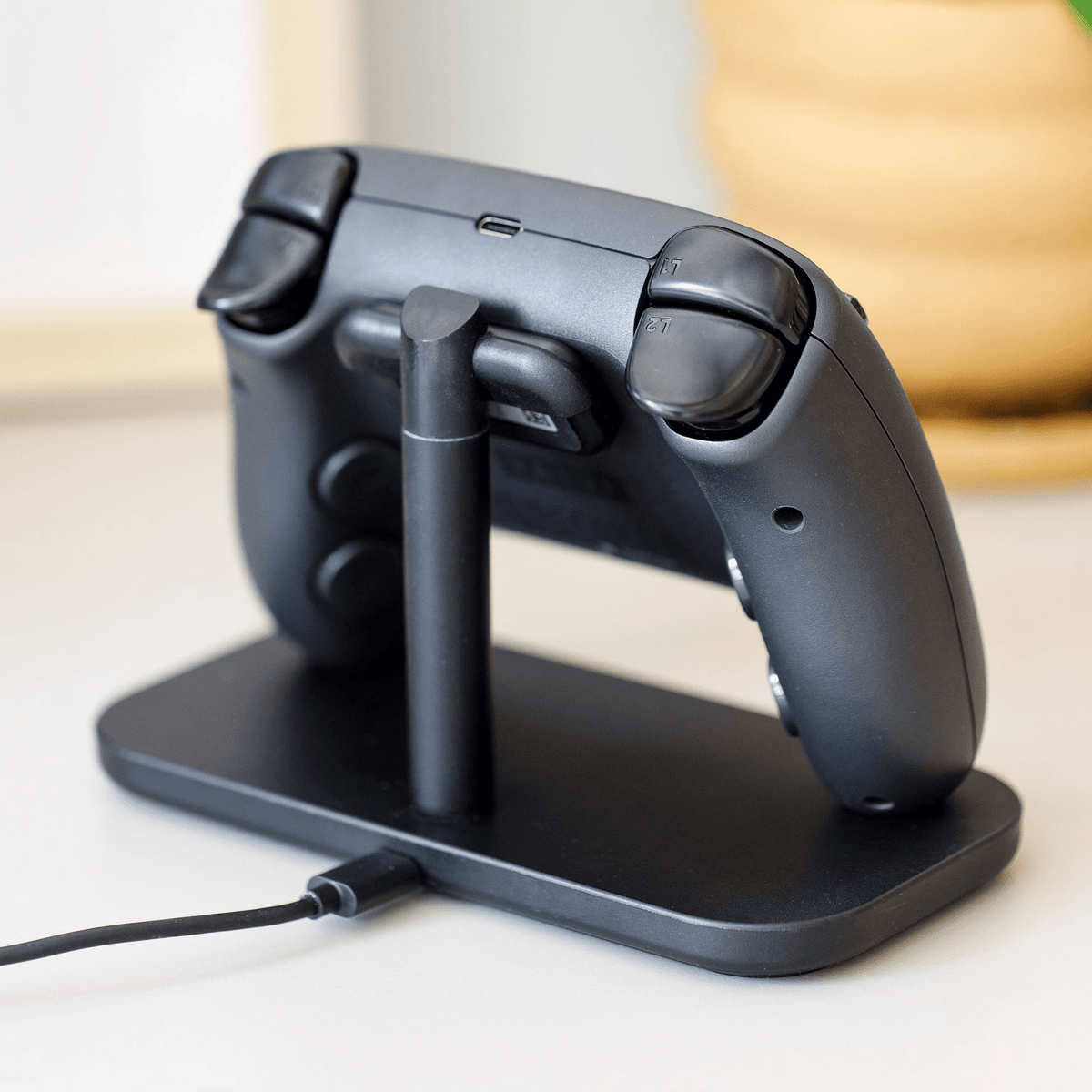 It works perfectly with the Steam Controller Dock