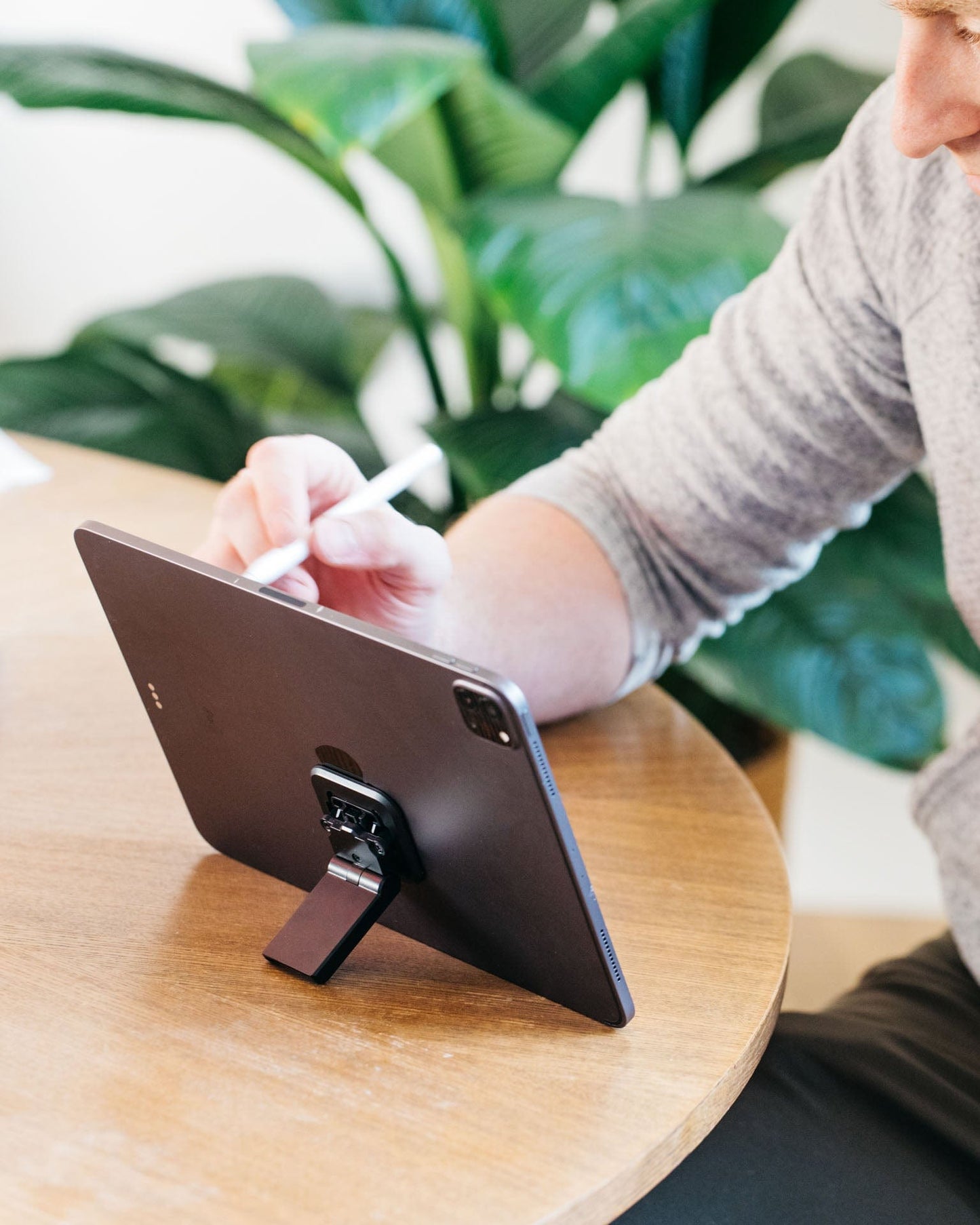 An ipad Propped up using the Deckmate Adapter and Kickstand